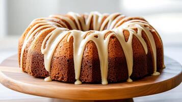 Moist chocolate bundt cake with rich drizzle of creamy frosting, perfect for celebrations photo