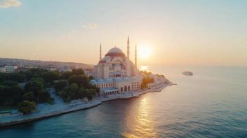 stunning golden hour view of Istanbul skyline featuring majestic mosque by water photo