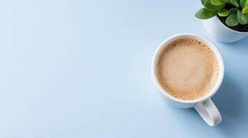 cozy cup of coffee sits light blue surface next to small potted plant, creating serene photo
