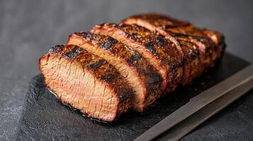 Perfectly cooked brisket with dark caramelized crust, showcasing juicy slices photo