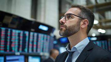 focused financial expert analyzing market trends in trading environment photo