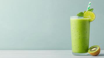 Refreshing green juice with kiwi, lime, and mint, perfect for healthy boost photo