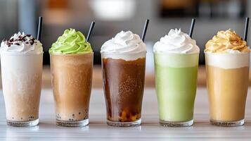 Delicious bubble tea drinks lined up in trendy cafe, showcasing vibrant colors and textures photo