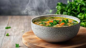 steaming bowl of homemade vegetable soup with lentils, garnished with fresh herbs, evokes warmth photo