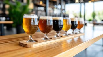 Craft beer tasting event with variety of beer styles displayed in glasses photo
