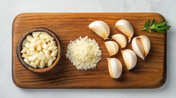 Fresh garlic cloves, minced garlic, and parsley wooden cutting board create vibrant kitchen photo