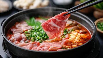 delicious hot pot featuring marbled beef, fresh vegetables, and aromatic broth, perfect for photo