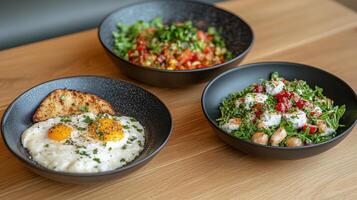 Delicious breakfast bowls featuring eggs, fresh vegetables, and herbs photo