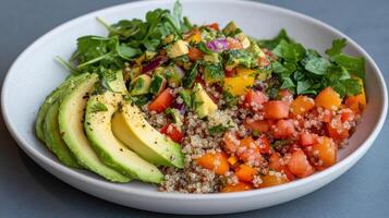 vibrant and healthy lunch plate featuring quinoa salad, fresh avocado slices, and colorful photo