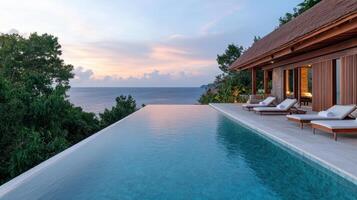 stunning infinity pool luxurious resort overlooking ocean, surrounded by lush greenery and photo