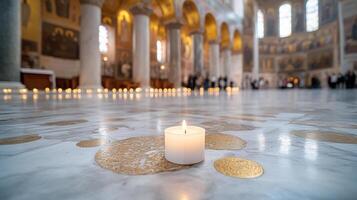 serene candle illuminates marble floor of grand Byzantine church, enhancing spiritual atmosphere photo
