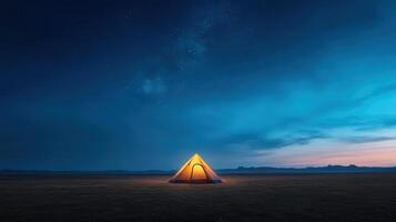 serene camping scene featuring glowing tent under starry sky, evoking tranquility and adventure photo