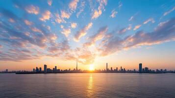 stunning skyline at sunset, showcasing vibrant colors reflecting on water photo