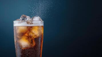 refreshing glass of soda filled with ice cubes, sparkling and inviting photo