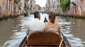 romantic gondola ride through canals of Venice, showcasing couple enjoying serene atmosphere photo