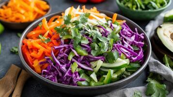 Fresh, colorful vegetable slaw with shredded cabbage, bell peppers, and herbs photo