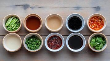 Fresh ingredients and sauces arranged in bowls, showcasing vibrant colors and textures photo
