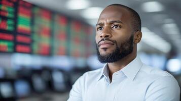 Focused financial analyst evaluating market trends and data in trading environment photo