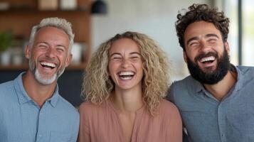 Laughing coworkers enjoying light hearted moment together in bright workspace photo