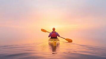 serene sunrise kayaking scene with lone figure paddling on calm waters photo