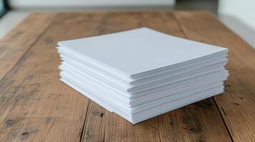 Stack of blank paper sheets on wooden table, perfect for printing or writing photo