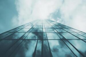 Skyscraper reflection of clouds in modern architectural design urban cityscape vertical perspective photo