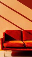 Modern red sofa in sunlit room with bold shadows on peach wall creating a striking geometric pattern photo