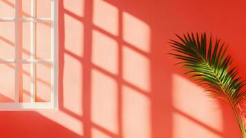 Sunlit room with palm leaf extension casting bold geometric shadows on a coral wall photo