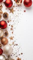 Festive christmas ornament arrangement with glittery stars and pinecones on a white background photo