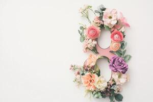 Floral number eight design with pastel flowers and greenery on a light background photo