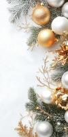Elegant christmas decoration with gold and silver baubles on evergreen branches photo