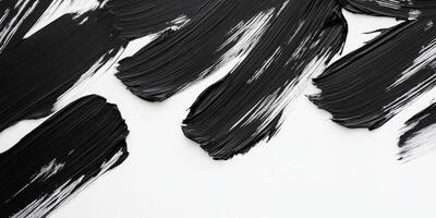 Abstract black brush strokes on white canvas creating dramatic contrast and visual texture in minimalist artistic composition photo