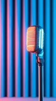 Vintage microphone with colorful lighting in retro music studio setting for creative audio production, photo