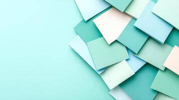 Abstract arrangement of pastel paper squares overlapping in a minimalist geometric pattern, photo