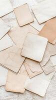 Vintage paper sheets layered on old map creating antique textured background for nostalgic concept, photo