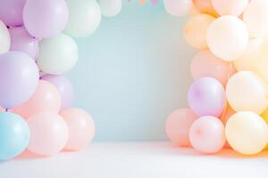 Colorful pastel balloons arranged for a festive celebration in a bright blue room with a joyful atmosphere photo
