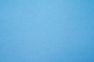 Blue paper sheet texture and background. photo