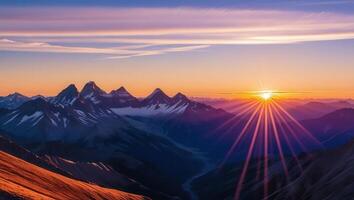 a mesmerizing view of mountains at sunrise. The sun's rays burst through the sky creating a radiant, scenic view photo