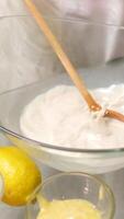 stir yeast into milk Unrecognizable female baker adds milk to the dough, stirring gently, prepares the base for the dough for baking bread video