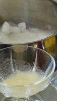melt sugar Baking. A young mother in comfortable clothes is making homemade cookies at home. A woman who follows proper nutrition prepares cookies at home without gluten and sugar. video