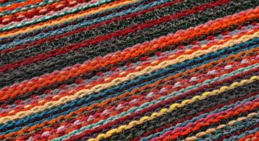 A close up of a colorful striped blanket photo