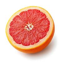A grapefruit is cut in half on a white background photo