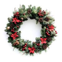 A wreath with red berries and pine cones photo