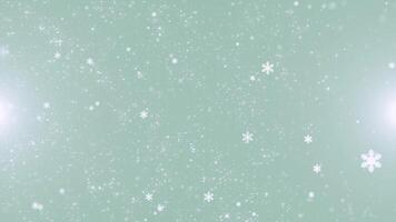 Delicate snowflakes float and dance against a soft pastel background, creating a serene and magical winter scene. video