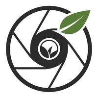 Abstract Circular Design with Lens Aperture and Green Leaf on White Background vector