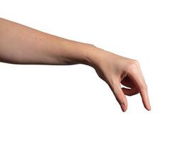 Hand in precise gesture, fingers holding an invisible object between thumb and index. Subtle motion, photo
