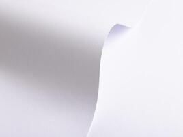 White paper background with a smooth texture and minimalistic design. A rich gradient effect with photo