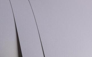 Elegant light gray paper texture with subtle striped overlay and fine edges. Premium designer photo