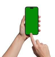 Hand holding a smartphone with a blank green chromakey screen, index finger tapping to capture or photo