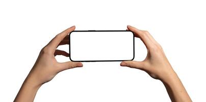Hand holding a smartphone horizontally with a blank screen, perfect for , gaming, and app photo
